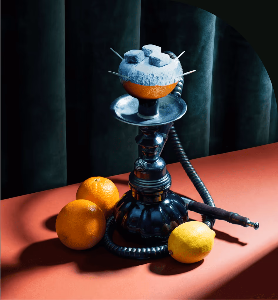 Premium citrus hookah surrounded by fresh oranges and lemon